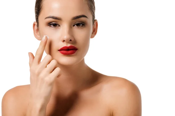 Attractive Girl Red Lips Applying Cream Face Looking Camera Isolated — Stock Photo, Image