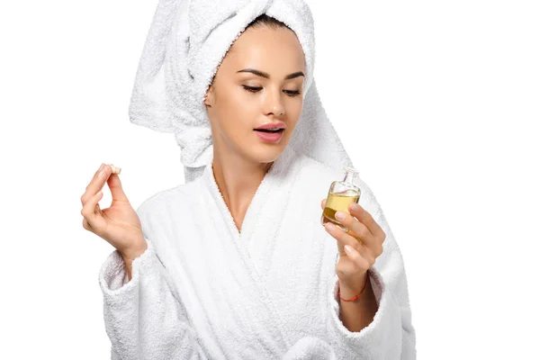 Attractive Girl Bathrobe Looking Opened Bottle Oil Isolated White — Stock Photo, Image