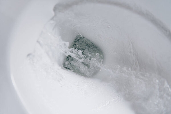 selective focus of flushing water in ceramic toilet 