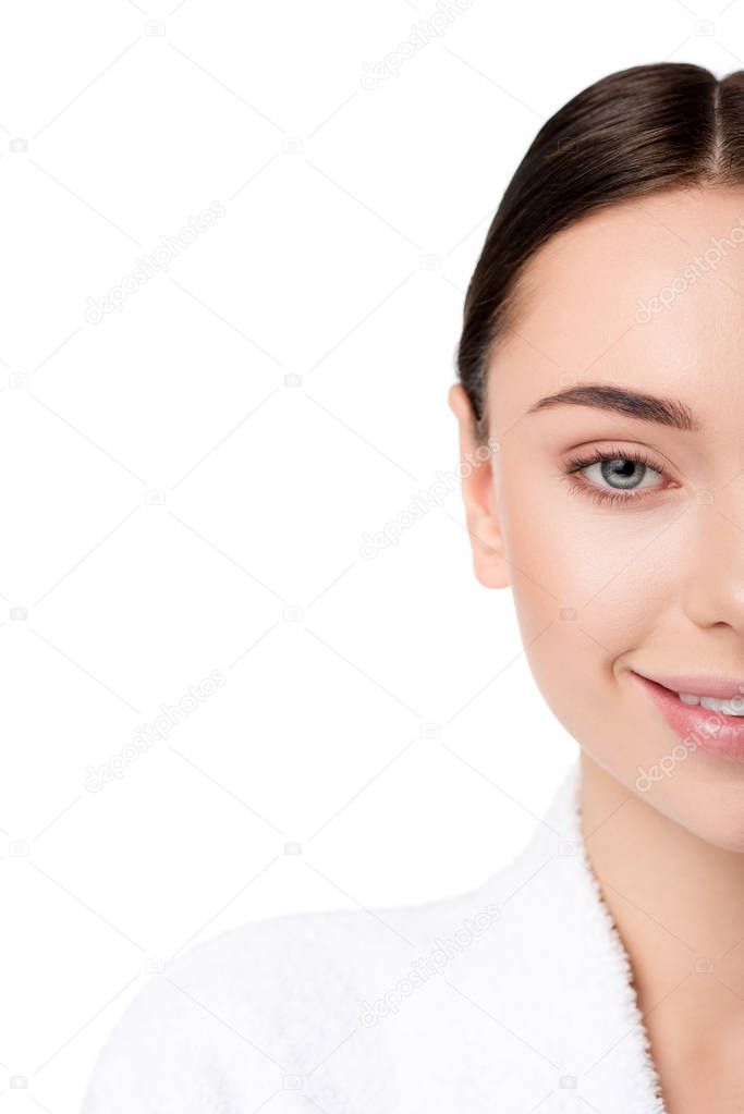 cropped view of beautiful smiling woman in bathrobe isolated on white with copy space