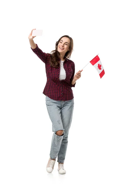 Happy Woman Holding Canadian Flag Taking Selfie Smartphone Isolated White — Stock Photo, Image