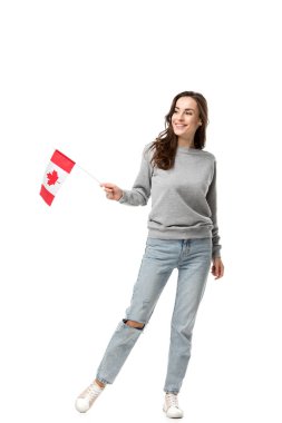 gri rahat kıyafetler Kanada bayrağı üzerinde beyaz izole tutmak gülümseyen güzel kadın