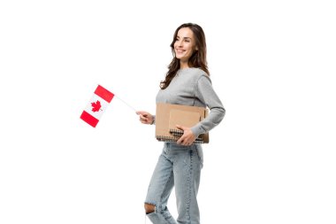 smiling female student holding canadian flag and notebooks isolated on white clipart