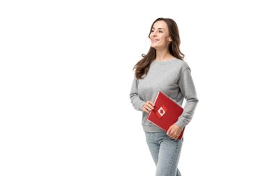 happy female student holding red notebook with maple leaf sticker isolated on white clipart