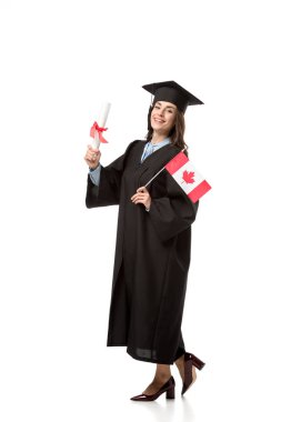 happy female student in academic gown holding canadian flag and diploma isolated on white clipart