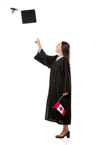 Female Student Academic Gown Holding Canadian Flag Throwing Mortarboard Air — Stock Photo, Image