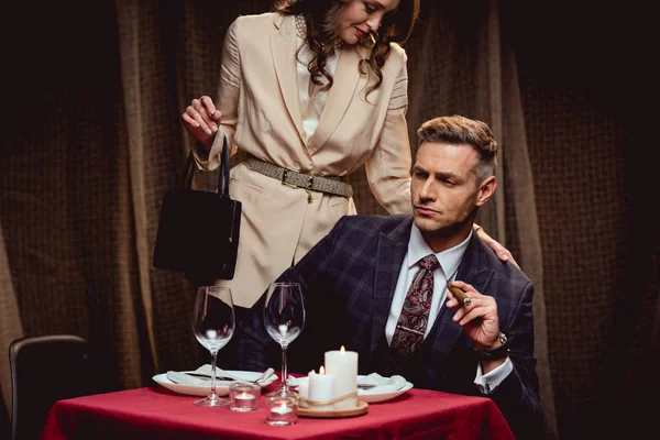 Woman Embracing Man Cigar Romantic Dinner Restaurant — Stock Photo, Image
