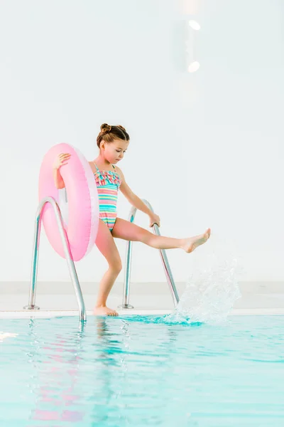 Adorable Kid Swimwear Holding Inflatable Ring Playing Water Swimming Pool — Stock Photo, Image