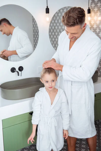 Happy Father Making Hair Cute Daughter Standing Bathroom — Stock Photo, Image