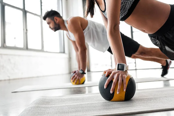 Cropped Shot Young Sportive Couple Exercising Medicine Balls Yoga Mats — Stock Photo, Image