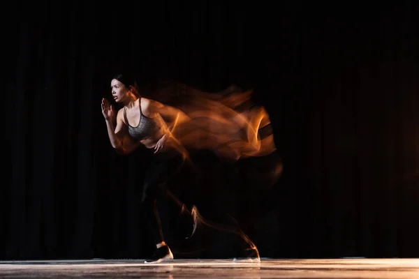 Blurred Motion Athletic Young Woman Sportswear Running Black — Stock Photo, Image