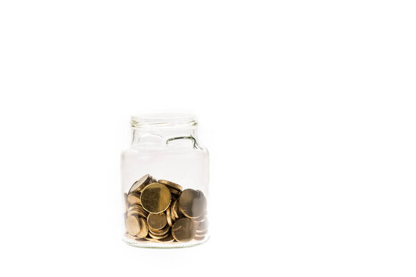 golden coins in glass jar isolated on white