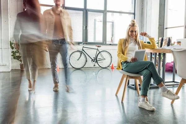 Smiling Casual Businesswoman Sitting Using Digital Tablet Loft Office Colleagues — Stock Photo, Image