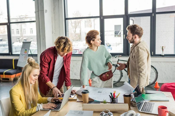 Group Female Male Architects Working Blueprint Desk Laptops Loft Office — Stock Photo, Image