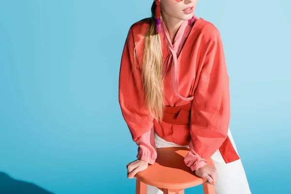 Cropped View Fashionable Woman Living Coral Clothing Posing Stool Isolated — Stock Photo, Image