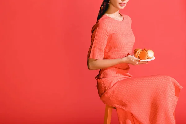 Cropped View Stylish Girl Holding Plate Macaroons Isolated Living Coral — Stock Photo, Image