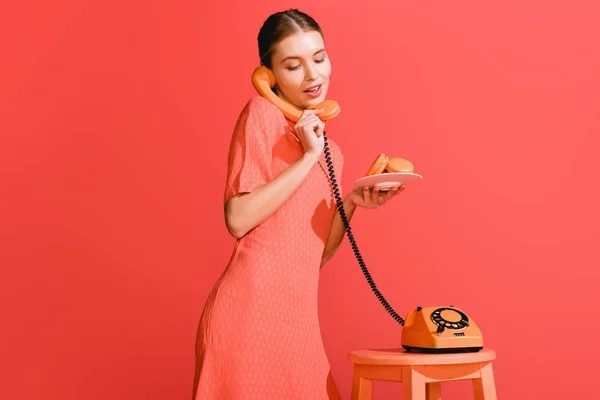 Beautiful Woman Sweet Macarons Rotary Phone Isolated Living Coral Pantone — Stock Photo, Image