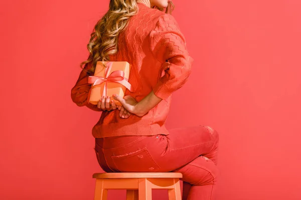 Back View Fashionable Woman Holding Present Sitting Stool Isolated Living — Stock Photo, Image