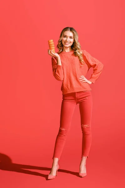 Cheerful Woman Holding Sweet Macaroons Living Coral Pantone Color Year — Stock Photo, Image