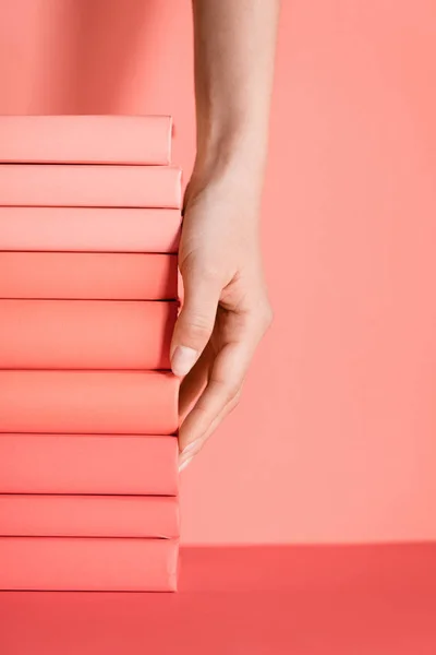 Partial View Female Hand Living Coral Books Pantone Color Year — Stock Photo, Image