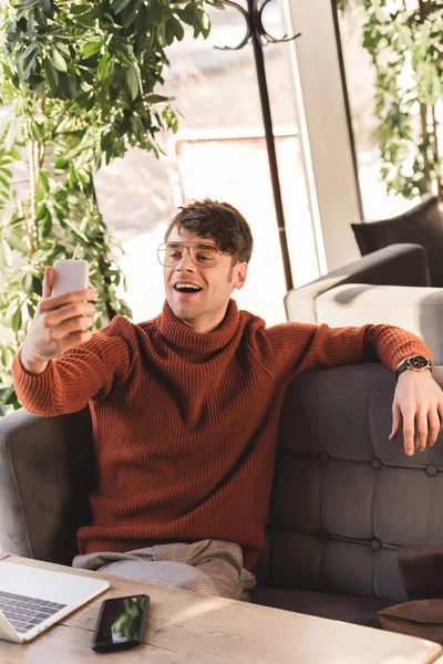 Cheerful Man Glasses Taking Selfie Laptop Cafe — Stock Photo, Image