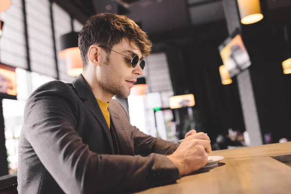 Handsome Man Sunglasses Looking Cup Coffee While Sitting Bar Counter — Stock Photo, Image