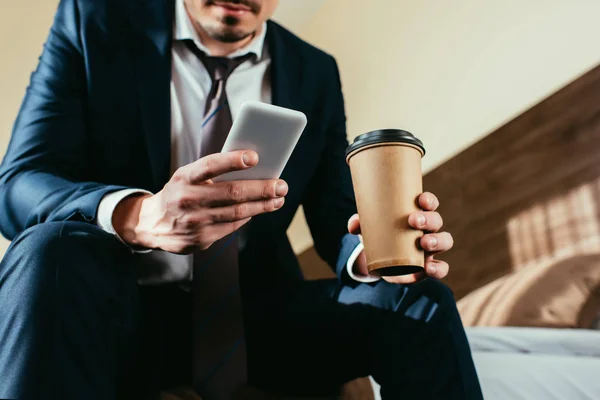 Cropped View Businessman Using Smartphone Holding Coffee Hotel Room — Stock Photo, Image