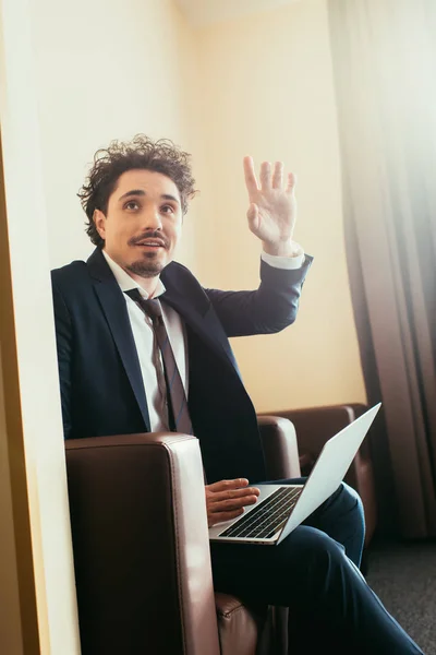 Businessman Gesturing While Working Laptop Hotel Room — Stock Photo, Image