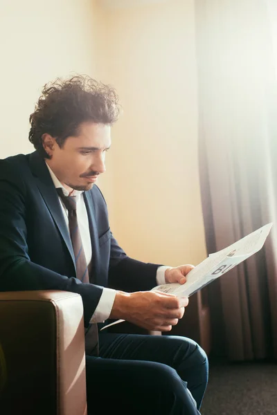 Businessman Suit Reading Newspaper Hotel Room Sunlight — Stock Photo, Image