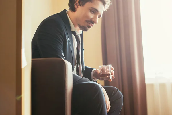 Pensive Businessman Formal Wear Holding Glass Cognac Hotel Room — Stock Photo, Image