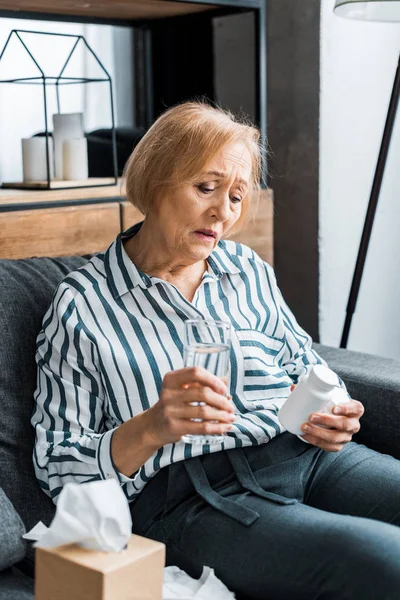 Sick Senior Woman Sitting Couch Tissue Box Holding Glass Water — Stock Photo, Image