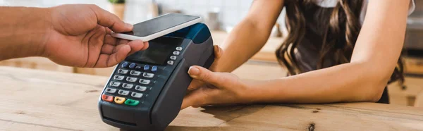 Cropped View Cashier Standing Bar Counter Holding Terminal Wile Man — Stock Photo, Image