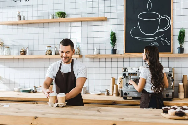 Cashier Putting Paper Cups Wile Barista Making Coffee Bar Counter — Stock Photo, Image