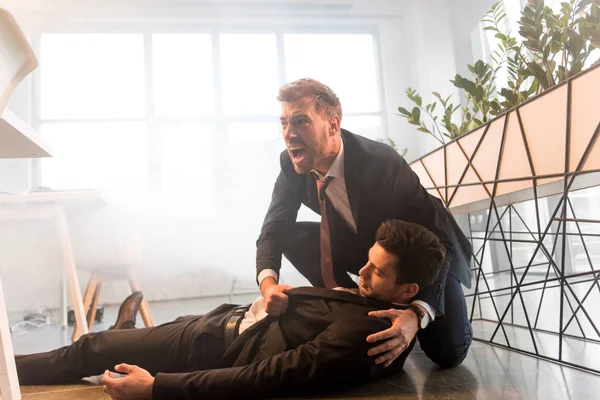 Terrified Businessman Screaming Colleague Lying Floor Office Smoke — Stock Photo, Image