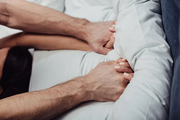 Cropped View Couple Holding Hands Lying Bed Home — Stock Photo, Image