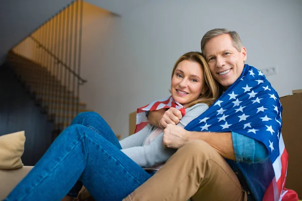 Happy Couple Wrapping Usa National Flag Looking Camera — Stock Photo, Image