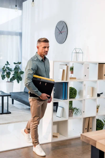 Pensive Businessman Standing Folders Modern Office — Stock Photo, Image