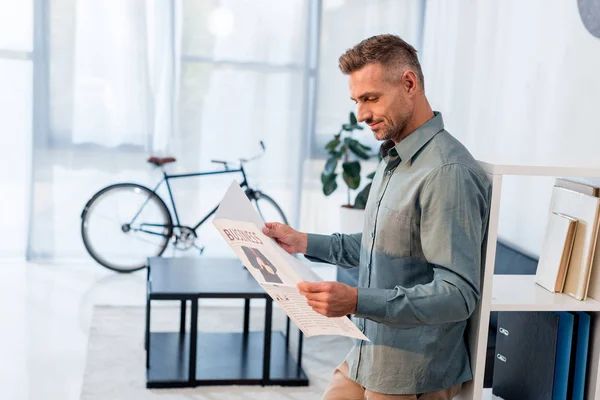 Cheerful Businessman Reading Business Newspaper Modern Office — Stock Photo, Image