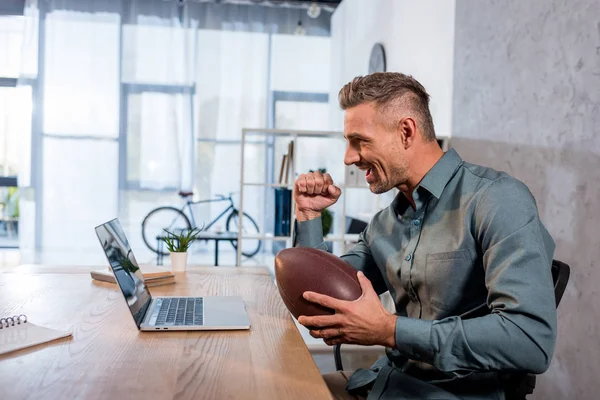 Happy Businessman Watching Championship Laptop Holding American Football Modern Office — Stock Photo, Image