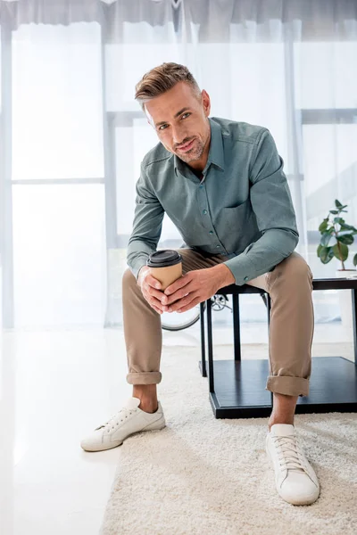 Handsome Man Sitting Coffee Table Holding Paper Cup Drink — Stock Photo, Image