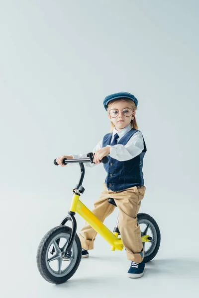 Serious Kid Retro Vest Cap Riding Bike Looking Camera Grey — Stock Photo, Image