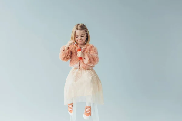 Adorable Kid Faux Fur Coat Skirt Sitting Highchair Holding Bottle — Stock Photo, Image