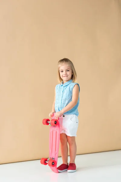 Adorable Smiling Kid Shirt Shorts Holding Pink Penny Board Beige — Stock Photo, Image