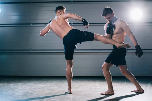 Back View Barefoot Mma Fighter Kicking Opponent Leg — Stock Photo, Image