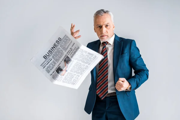Angry Mature Man Formal Wear Throwing Business Newspaper While Standing — Stock Photo, Image