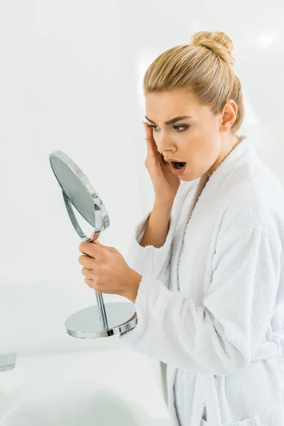 Shocked Beautiful Woman White Bathrobe Looking Mirror Bathroom — Stock Photo, Image