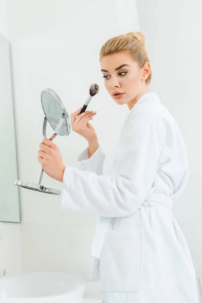 Attractive Blonde Woman White Bathrobe Using Cosmetic Brush Bathroom — Stock Photo, Image