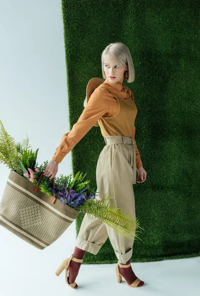 Beautiful Stylish Young Woman Holding Bag Fern Flowers White Green — Stock Photo, Image