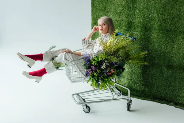 Beautiful Stylish Girl Looking Camera While Sitting Shopping Cart Fern — Stock Photo, Image