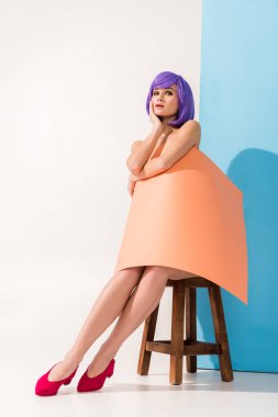 beautiful girl with purple hair covered in coral paper sheet sitting on chair while posing on blue and white clipart